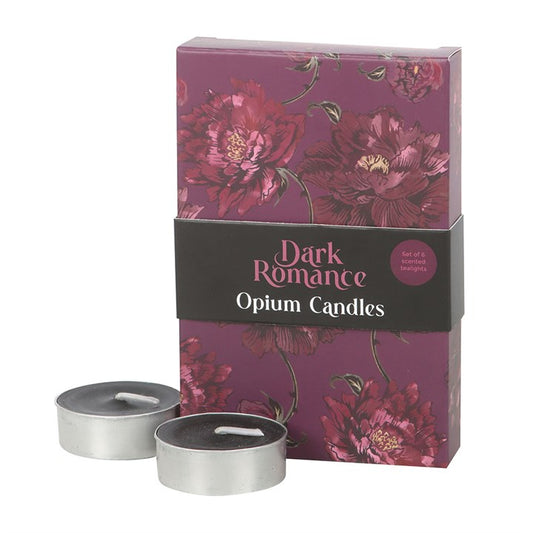 Step into the velvet hush of night, where shadows thicken and secrets stir. These opium-scented tealights are crafted for those who walk the mysterious path—ideal for quiet rituals, whispered intentions, or evenings steeped in intoxicating enchantment.

Each candle releases a heady, resinous aroma that coils through your space like drifting incense, wrapping your chambers in warm, sultry darkness. Housed in matching dark botanical designs, they burn for approximately five hours each, offering steady flame f