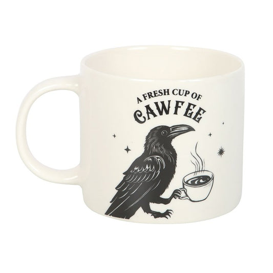 “When the raven calls, the brew is ready.”
Awaken your senses with the Fresh Cup of Cawfee Mug, a gothic ceramic vessel adorned with a striking raven illustration clutching its own steaming cup. With a generous 500ml capacity, this mug is perfect for coffee lovers who walk the line between the mysterious and the mundane. Microwave and dishwasher safe, it is crafted for both practicality and magical flair.

In folklore and witchcraft, the raven is a creature of prophecy, wisdom, and transformation. Believed 