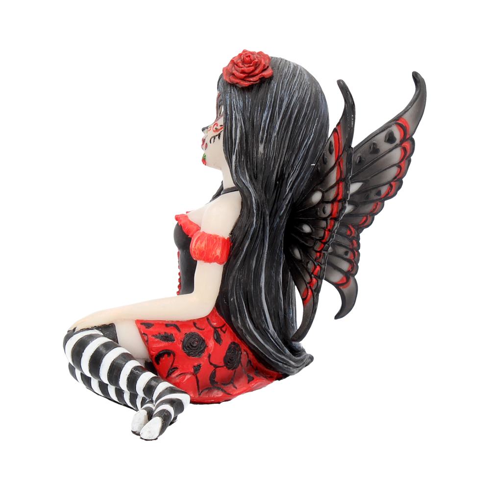 This stunning Fairy, Rosalia, was created by Fantasy brand Nemesis Now. She innocently sits with her striped legs extended to the side, wearing a black corseted dress that has a red skirt detailed with black roses.
