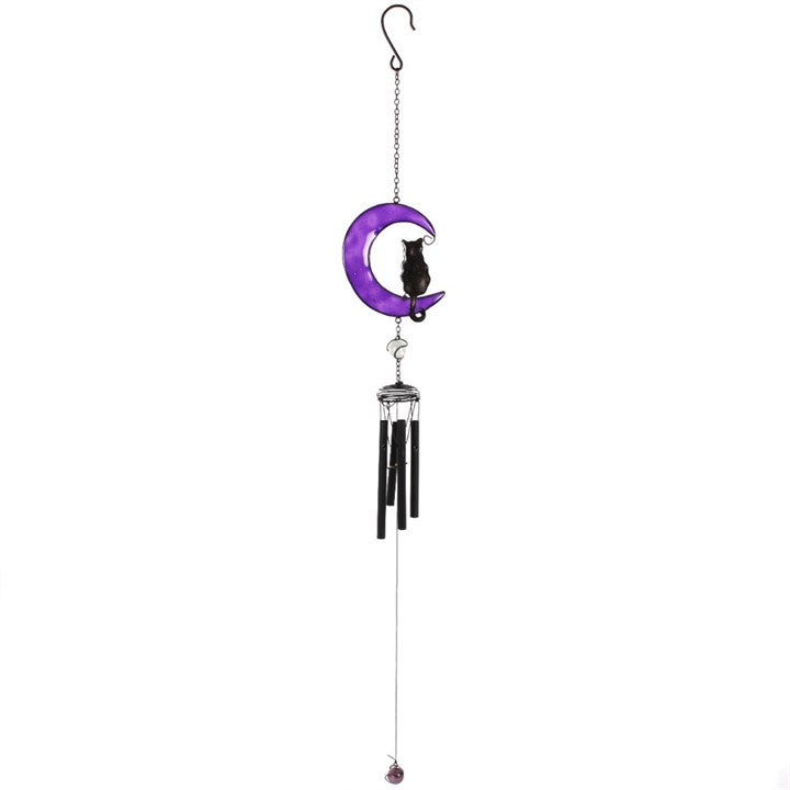 Embrace the enchanting whispers of the Black Cat Windchime, a mystical blend of hand-crafted metal, glass, and resin shaped into a captivating black cat design. Ethically sourced and imbued with protective energy, this windchime is perfect for both indoor sanctuaries and outdoor gardens. As gentle breezes stir its delicate chimes, invite harmony and subtle magic into your space. Measuring 50cm tall, it’s a striking talisman that balances beauty and spirit, making it an essential charm for any witch’s garden