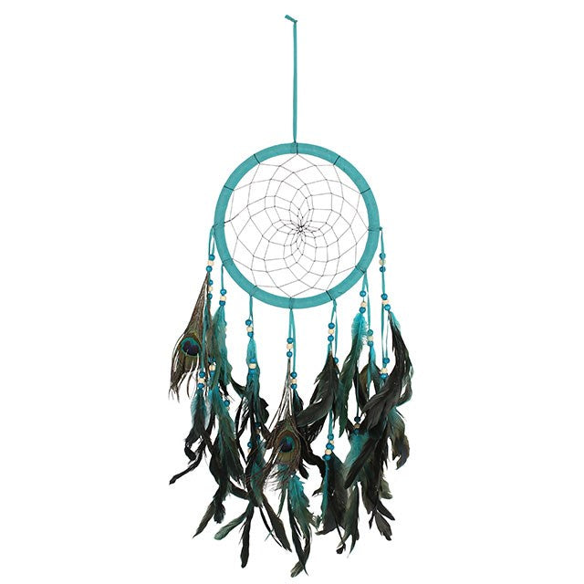The dreamcatcher is more than just an ornament — it is a sacred shield woven to guard the spirit. In the tradition of the Ojibwe people, dreamcatchers were hung above the resting place to catch wandering dreams. The web allows the good to pass gently through, while the bad dreams become snared in the strands and vanish with the first light of dawn.

This Turquoise Peacock Feather Dreamcatcher carries the medicine of two powerful symbols. Turquoise, the stone of sky and water, is honored as a sacred stone of