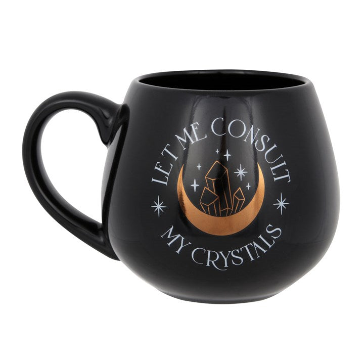 Black ceramic mug with “Let Me Consult My Crystals” text and gold foil design. Perfect gift for witches, crystal lovers, and mystical home décor.