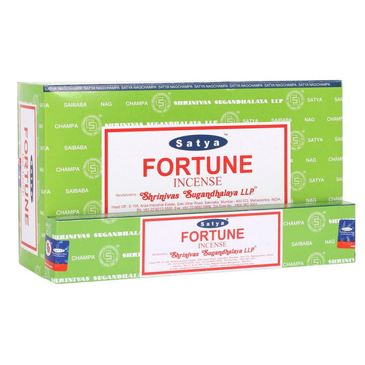 Discover 12 inner bundles of Fortune incense sticks in this box, crafted by skilled Indian artisans using premium, natural ingredients. Each pack holds 10-12 vegan-friendly sticks, perfect for invoking positive energies and mystical vibes.