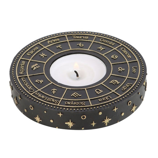 This beautiful tealight candle holder depicts the astrology wheel in intricate, gold-effect detail that looks beautiful when a lit candle is placed in the centre. A perfect finishing touch for any home with a celestial-inspired decor.