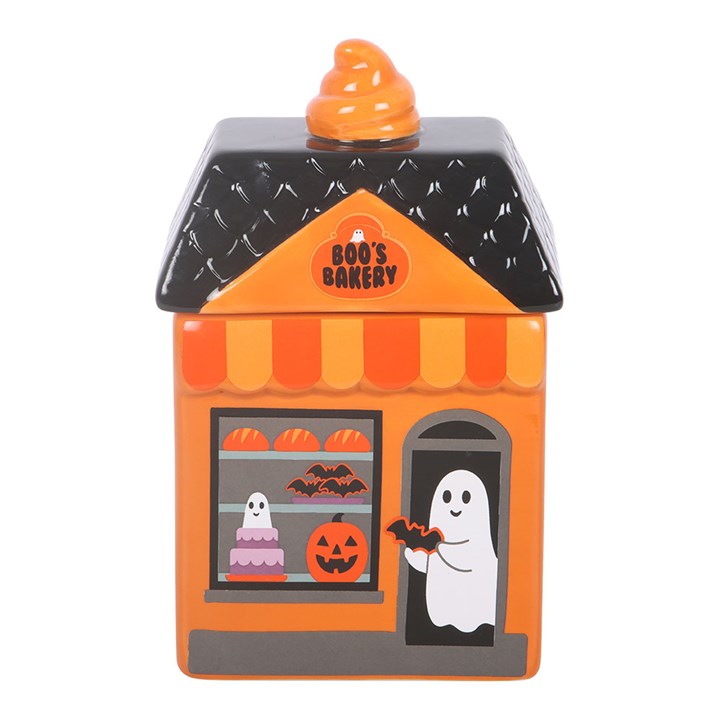 Add a sweet yet spooky glow to your home with this delightful ceramic oil burner shaped like a miniature bakery. Adorned with tiny treats and a friendly ghost host, it creates a warm and inviting atmosphere when used with your favorite scents. A perfect decorative and functional home accessory for Halloween. Always remove the lid whilst in use. Recommended for use with fragrance oil diluted with water.
