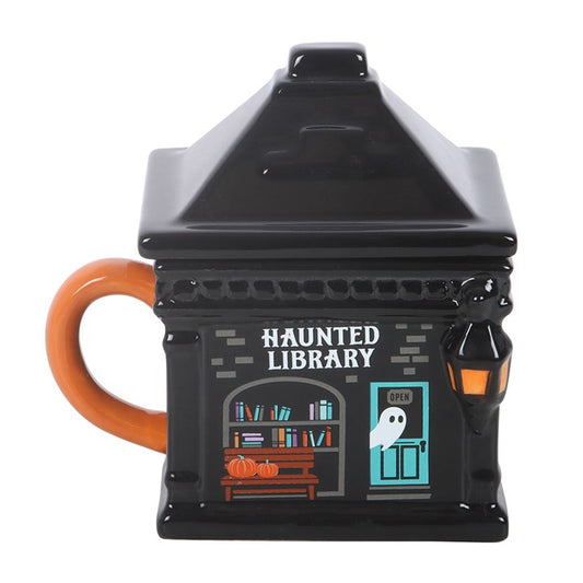 Curl up with a spooky story and a warm drink using this Haunted Library ceramic lidded mug, perfect for creating a cosy Halloween moment at home. With its cute ghost design, it makes a lovely gift for readers and lovers of all things autumnal. 320ml capacity. Do not microwave. Hand wash only.