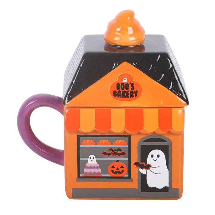 Add a dash of sweetness to your day with this Boo's Bakery ceramic lidded mug, perfect for enjoying hot drinks alongside seasonal treats. Its playful ghost design makes it a wonderful gift for Halloween fans or anyone who enjoys fun and festive kitchenware. 350ml capacity. Do not microwave. Hand wash only.