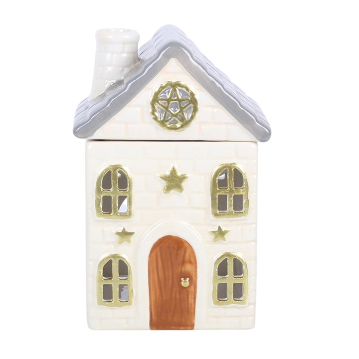 Bring grounding earth energy to the home with this Stone Cottage oil burner, finished with rustic cottage details, star accents and a warm, welcoming look. A thoughtful pick for winter rituals, seasonal gifting and creating a magical focal point on shelves or side tables. Recommended for use with fragrance oil diluted with water. Always remove the lid whilst in use.