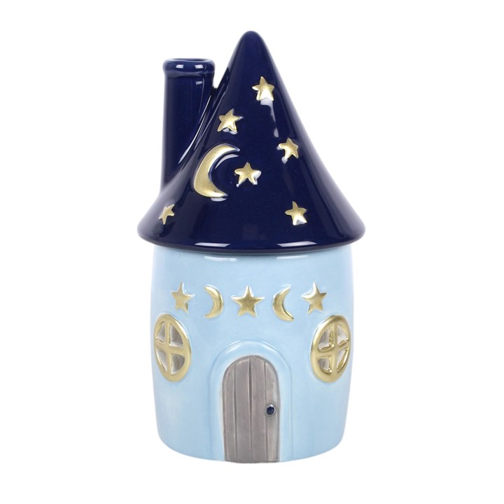 Call on air magic with this Celestial Cottage oil burner, featuring a pointed starry roof, crescent moon details and a dreamy celestial design. Ideal for solstice displays, meditation spaces and adding a mystical touch to the home. Recommended for use with fragrance oil diluted with water. Always remove the lid whilst in use.