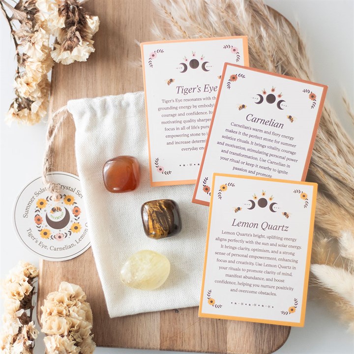 Celebrate the sun's radiant energy with this Summer Solstice crystal set featuring Tiger’s Eye, Carnelian, and Lemon Quartz. With each stone known for its uplifting and empowering properties, this set is perfect for summertime rituals, meditation, or daily intention-setting. Includes an eco-friendly drawstring pouch and informative crystal cards.