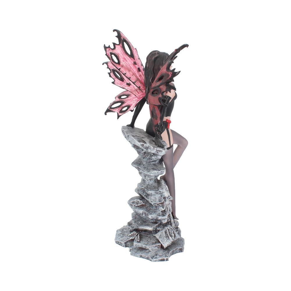 Fairy figurine with pink wings on a white background