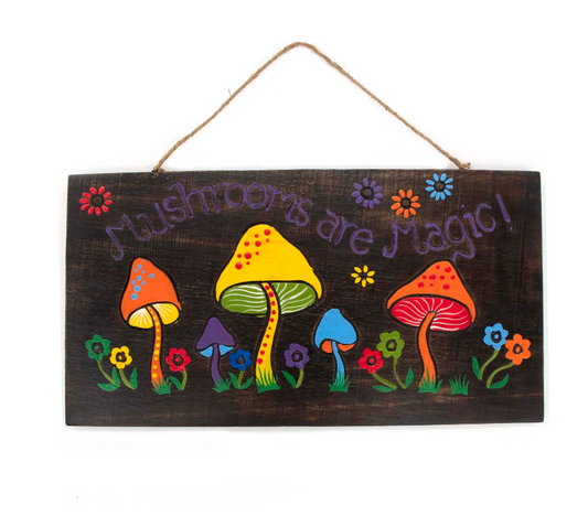 This enchanting wall plaque showcases vivid hand-painted wildflowers intertwined with towering mushrooms, set against rich dark wood. Measuring an impressive 40cm by 21cm, its bold presence casts a spell of wonder in any room. Ready to hang with included twine, this handcrafted treasure from Indonesia invites a mystical charm into your home, perfect for those who seek magic in every corner.