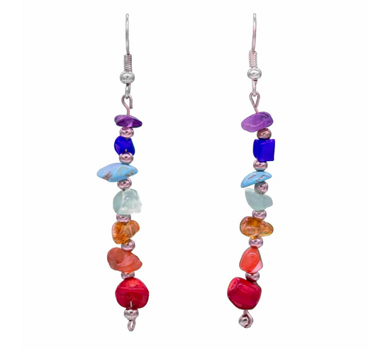 Let thy energy flow, pure and balanced, with these radiant Chakra Stick Earrings. 🌈✨

Each earring is adorned with seven vibrant stones, harmoniously stacked to represent the seven sacred chakras—from root to crown. Handcrafted in the mystical lands of Peru, these earrings are more than adornment; they are tools of alignment, colour magick, and energy protection.

Lightweight and full of soul, they dangle gracefully, catching light and attention while keeping your spiritual center's in balance. Whether wor