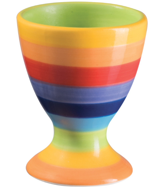 Begin your mornings with a touch of magic and colour with the Rainbow Stripe Ceramic Egg Cup, hand painted with radiant rainbow stripes that make each piece one-of-a-kind. Handmade in Thailand, this cheerful little vessel carries the warmth of traditional craftsmanship and the uplifting spirit of vibrant colour.

Perfect for brightening the breakfast table, this egg cup brings a welcoming charm to homes, tea rooms, and B&Bs alike. Its glossy glaze enhances the multi-coloured stripes, while the handmade fini