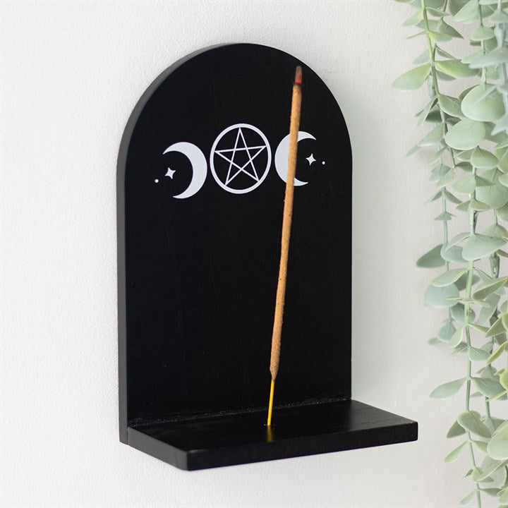 Black wooden triple moon incense holder shelf. Ideal for incense sticks, crystal display, and mystical home or altar décor with easy wall mounting.