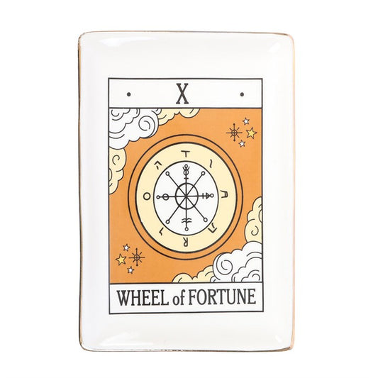 This enchanting trinket dish, inspired by tarot, is ideal for keeping jewellery, keys, and cherished keepsakes safe. Adorned with a graceful Wheel of Fortune motif and shimmering gold trim, it brings a magical aura to your desk, vanity, or bedside table. Crafted by Something Different Wholesale, it belongs to the Vintage Tarot collection, perfect for those drawn to mystical home accents and gifts.