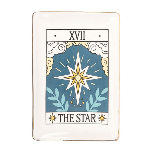 The Star Vintage Tarot Trinket Dish is a mystical addition to your sacred space, ideal for keeping your jewellery, keys, and cherished small treasures safe. Adorned with the enchanting Star tarot card design and delicate gold edging, this dish radiates a magical aura that enhances any desk, vanity, or side table. Its vintage-inspired charm invites positive energy and serves as a beautiful reminder of hope and guidance, making it both a practical and spiritual keepsake for your daily rituals. Embrace the mag