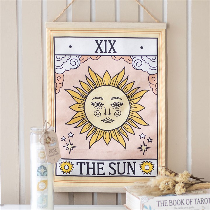 Framed tarot card poster titled 'The Sun' with decorative elements on a neutral background.