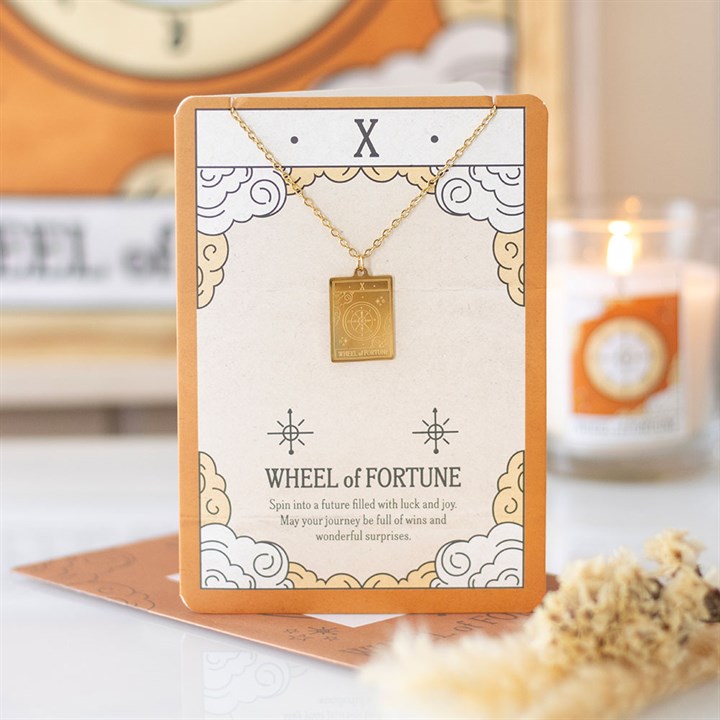 This gold-toned pendant necklace features The Wheel of Fortune tarot card design, symbolising luck and joy. Presented on a beautifully illustrated greeting card, it makes a thoughtful gift for tarot lovers and celebrating life’s precious moments.