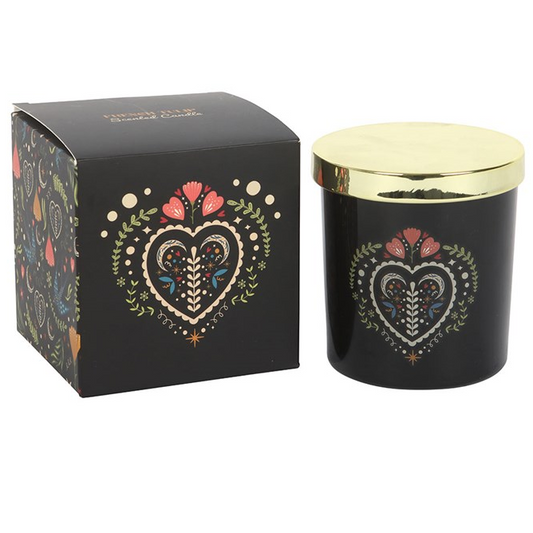 Unwind in style with this elegant French Tulip scented candle housed in a sleek black glass jar featuring a striking folk heart design. Ideal for creating a cosy, floral-scented space or gifting to someone who enjoys luxe home fragrance. Approximately 28-hour burn time. Made from paraffin wax. Never leave a lit candle unattended.
