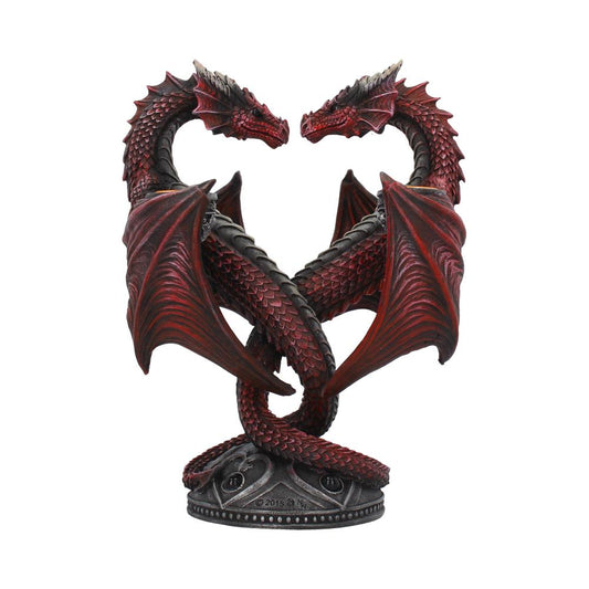 Statue of two red dragons intertwined on a white background