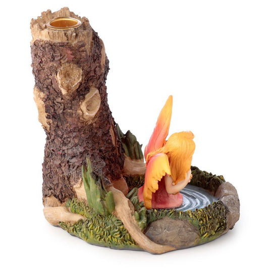 Step into the realm of enchantment with the Ancient Tree Fairy Lake Backflow Incense Burner. Crafted with intricate detail, this mystical piece depicts a sacred tree overlooking a fairy’s hidden lake, where cascading smoke flows like mist across still waters.

In folklore, ancient trees are guardians of wisdom and gateways between worlds, while fairies are seen as keepers of magic and transformation. Together, they symbolize protection, balance, and renewal. When paired with backflow incense cones, the smok