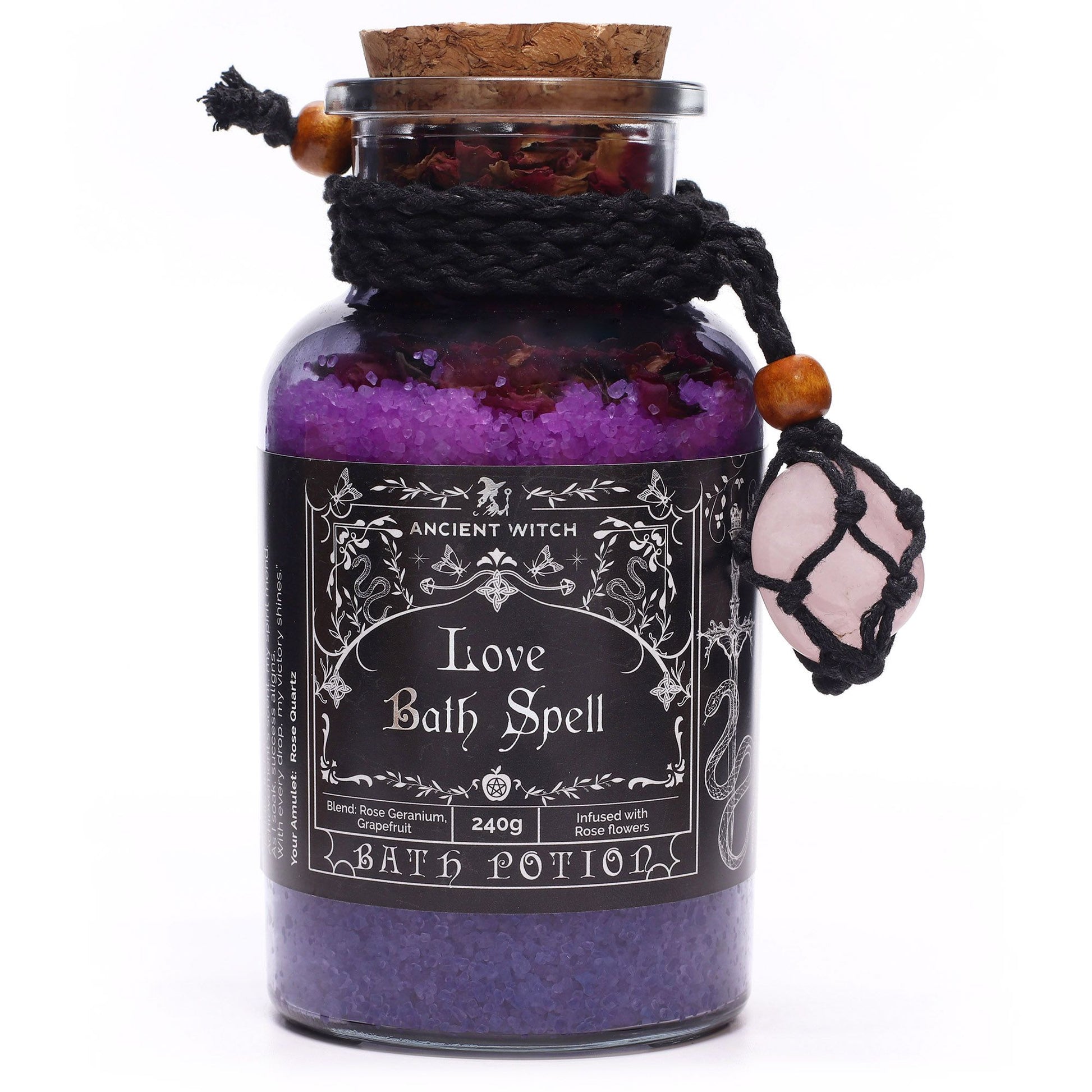 Awaken the gentle current of love and emotional renewal with the Ancient Witch Love Bath Spell Potion & Rose Quartz Crystal Amulet. Handcrafted with intention, this 240g potion blends Epsom salt, dried rose petals, and the sensual aroma of rose geranium and grapefruit essential oils to create a soothing ritual that nourishes both heart and spirit.

Each apothecary-style glass bottle is sealed with a natural cork and wrapped in a black cord necklace featuring a genuine Rose Quartz tumble stone — the sacred c