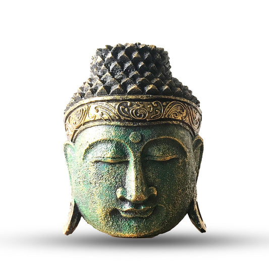 The green glow of the Buddha is the breath of renewal, a blessing of balance, healing, and harmony.

This 25cm Buddha Head Statue is hand-carved from eco-friendly albasia wood by skilled artisans in Indonesia and finished with a luminous green shine effect. The soft yet vibrant tones highlight the Buddha’s serene expression, making this statue both a spiritual emblem and a refined piece of home décor.

The Buddha head, in Buddhist tradition, represents enlightened awareness and inner peace. The green finish
