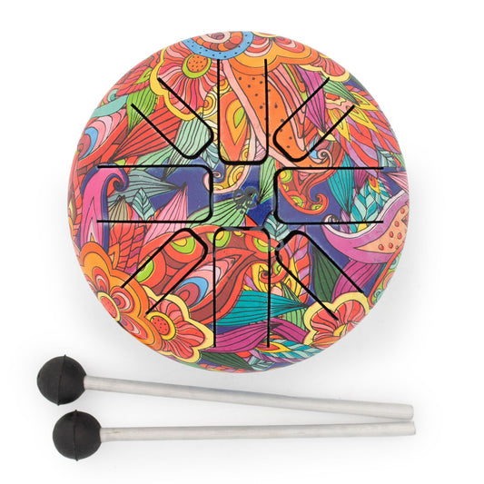 A small Hapi Drum with a bold psychedelic pattern, combining bright colours with a simple, easy-to-play design. The detailed, flowing print gives it a strong visual presence, making it just as appealing as a decorative piece as it is to play.