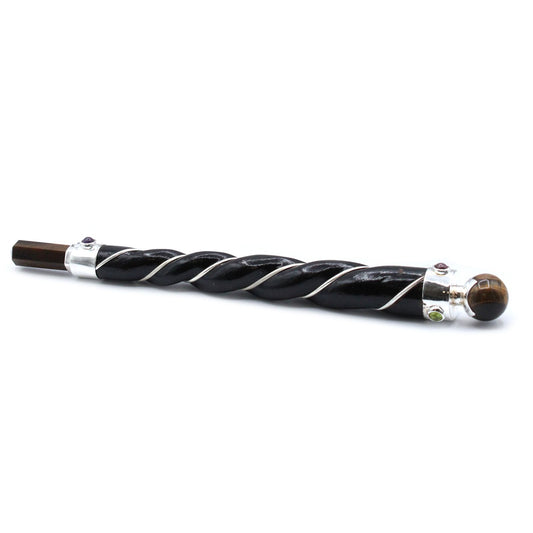 Awaken your inner strength and focus with the Twisted Healing Wand – Copper Tiger Eye Star. This handcrafted wand is a sacred tool of grounding energy, shaped in a graceful spiral to channel and direct intention with clarity. At its heart rests a polished Tiger Eye star, infused with copper’s natural conductivity to magnify your energy and stabilize your spirit.

Tiger Eye is a powerful stone of protection, known to shield against negativity while enhancing willpower, focus, and inner courage. The copper se
