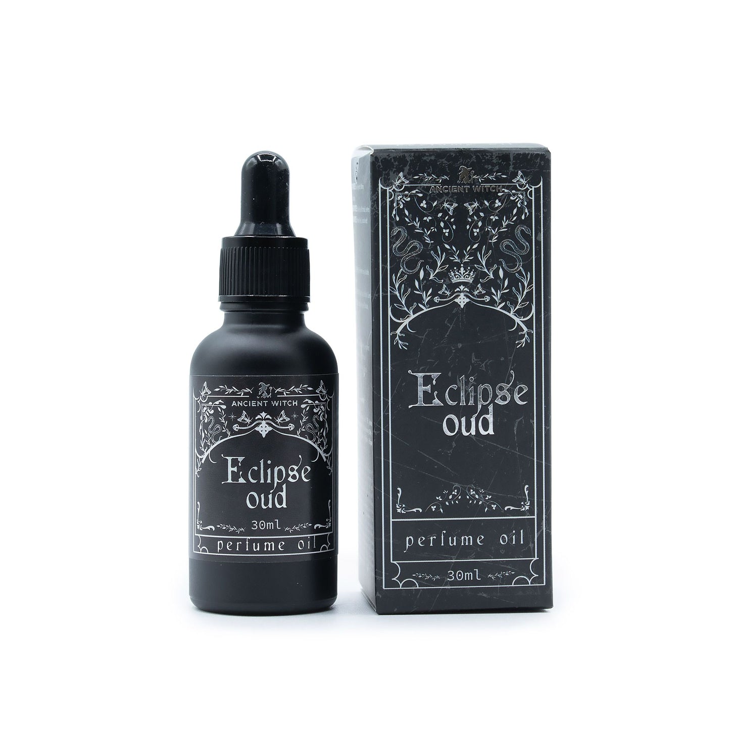 Eclipse Oud perfume oil by Ancient Witch. Spiced opening, rich oud heart and warm amber base create a bold, smoky ritual fragrance.