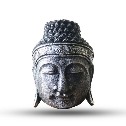 The silver glow of the Buddha’s face reflects calm wisdom, guiding the mind toward peace and clarity.

This 25cm Buddha Head Statue is hand-carved from eco-friendly albasia wood by skilled artisans in Indonesia and finished with a silver shine effect that brings a luminous, contemporary elegance to the piece. The serene expression and finely carved features embody tranquillity, making it a timeless addition to any home or meditation space.

In Buddhist tradition, the Buddha head symbolizes enlightened aware