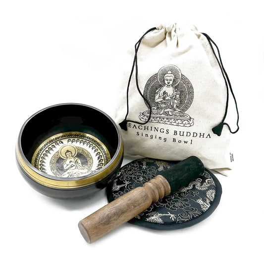 Singing bowl set with a bag labeled 'Teachings Buddha' on a white background