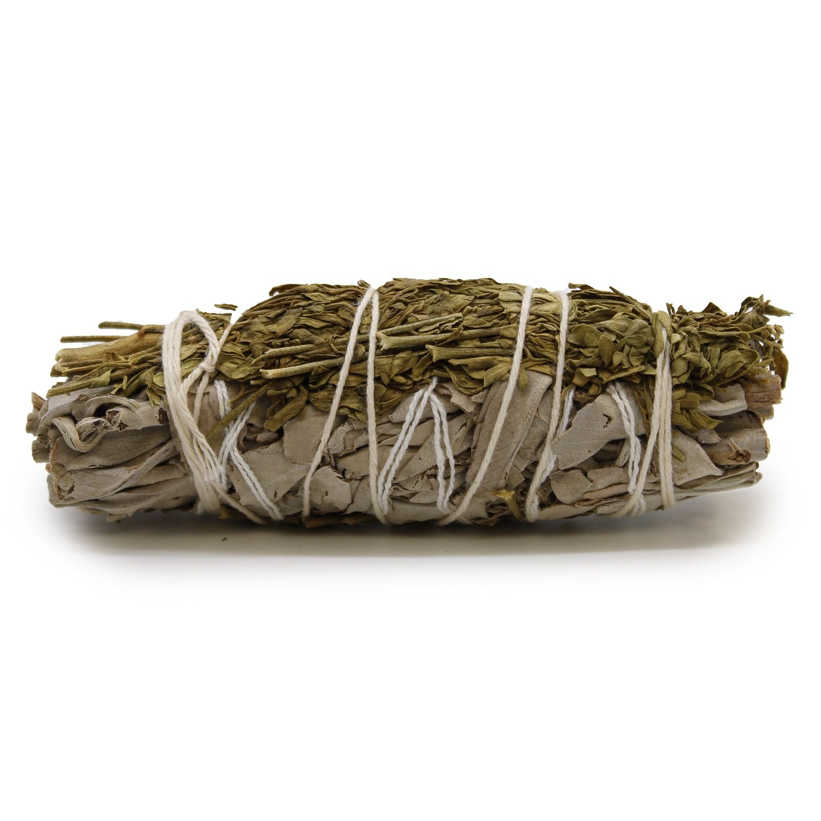 Bundled sage with white string on a white background