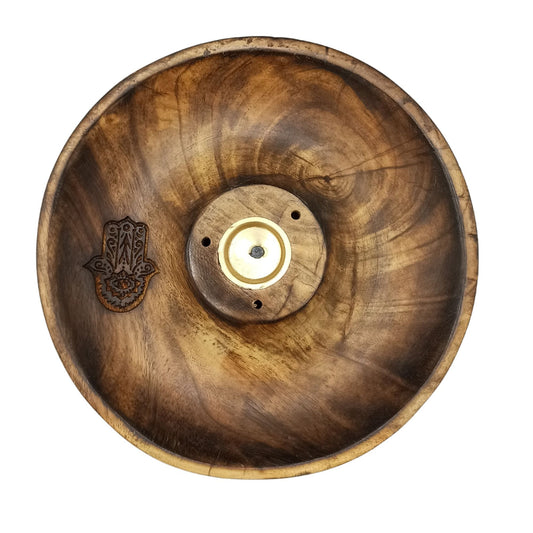 Invite divine protection and sacred calm into your space with the Incense Stick &amp; Cone Burner Disc – Hamsa. Featuring the ancient symbol of the Hamsa hand, this burner is a powerful talisman against negativity and a radiant emblem of blessings, peace, and intuition. Designed to hold both incense sticks and cones, it offers a grounded and meaningful addition to your daily rituals and sacred space.

The Hamsa is known across cultures as a guardian against harmful energy and a beacon of spiritual light. As