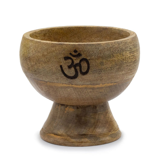 From the sacred collection of thewitchesgarden, this Ritual Bowl Incense Holder has been crafted as a vessel of balance and spiritual presence. Designed to cradle both incense sticks and cones, its rounded form gathers falling ash with ease, ensuring purity is maintained within your altar or meditation space. At 11cm wide and 10cm tall, its proportions invite harmony, making it a fitting companion for solitary practice or sacred gatherings. The etched OM symbol within the bowl resonates with the vibration o
