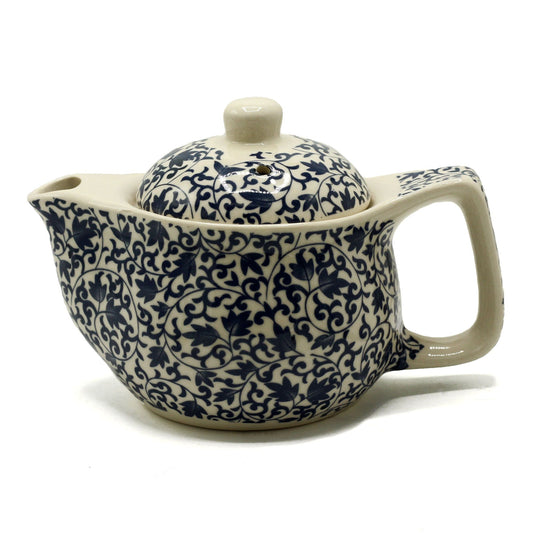 Infuse your tea rituals with calm sophistication through the Small Herbal Teapot – Blue Pattern by The Witches Garden. Designed for those who cherish quiet moments and mindful living, this elegant teapot transforms every pour into an act of peace and contemplation.

Crafted from high-quality ceramic, it promises durability, beauty, and timeless appeal. The blue patterned glaze captures the harmony of flowing water and open sky, bringing balance and serenity to your tea table. Inside, a fine metal strainer e