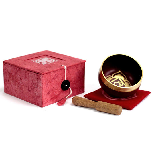 Anchor your spirit. Stand your ground. Call back your power.
The Root Chakra Singing Bowl resonates with the primal pulse of the Earth — grounding you deep into stillness and strength. Linked to the Muladhara chakra, found at the base of the spine, it awakens your instinct for survival, safety, and sacred presence.

Its bold red hue vibrates with the stabilizing forces of Earth and Saturn, reminding us we belong here — strong, supported, and safe. Infused with the energy of Garnet, Onyx, Ruby, and Obsidian,