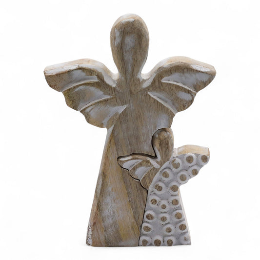 From the heavenly artisans of thewitchesgarden, this Mango Wood Angel in Angel figurine embodies the sacred embrace of love, guidance, and protection. Hand-carved from natural mango wood, the larger angel shelters the smaller within its wings — a tender symbol of care that speaks to the bonds of family, friendship, and spiritual connection.

Finished in a soft whitewash, each piece carries the gentle warmth of natural grain and the rustic grace of handcrafted artistry. Made in India, this double-angel desig