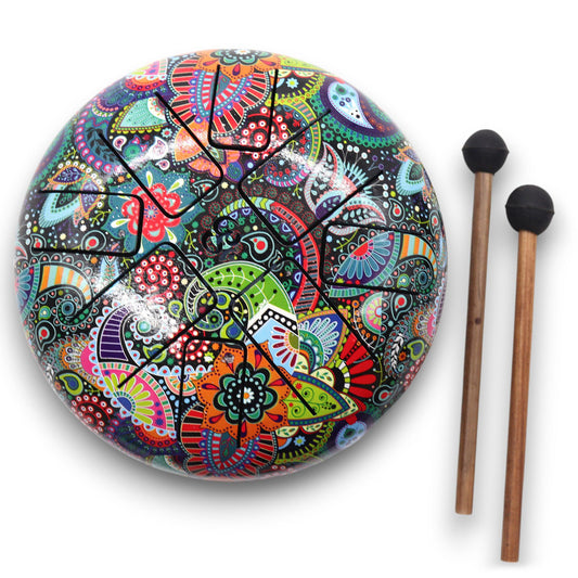 Experience the vibrant dance of sound and colour with the Hapi Drum Multi Coloured Om – 18cm. This beautifully crafted steel tongue drum combines the sacred Om symbol with a radiant spectrum of chakra-inspired colours, inviting a holistic journey through your energy centres.

Each of the 8 harmonious tones aligns with the chakras, helping to balance, clear, and uplift your energetic field. The vivid colours visually stimulate healing, while the Om grounds the vibration in spiritual connection and sacred man