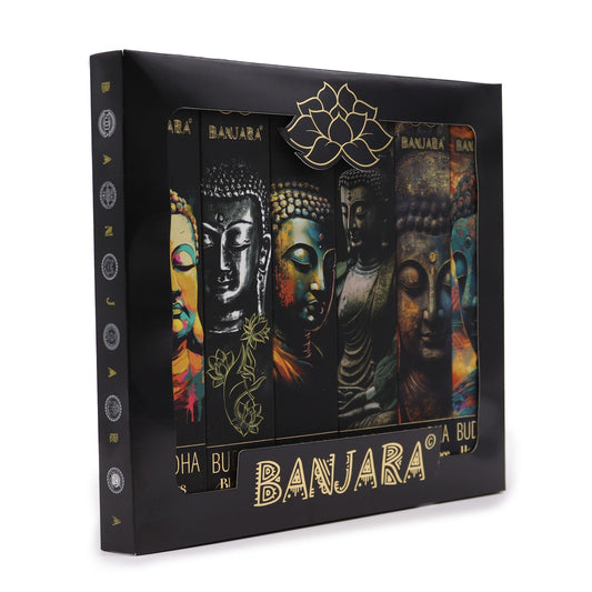 Discover a collection of six fragrant pathways with this Banjara Buddha Incense Gift Set, handmade in India and beautifully presented for those seeking serenity, meaning, and spiritual depth. Each variety is crafted from natural ingredients and burns slowly, releasing a long-lasting aroma that transforms any space into a sanctuary of peace.

Inside the set, you’ll find six unique fragrances, each created to support a different aspect of the soul’s journey:

• Meditation – Enhances focus, stillness, and mind