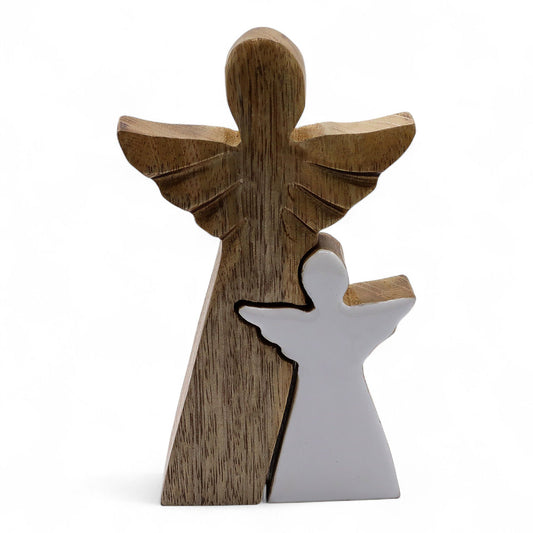 From the ethereal collection of thewitchesgarden, this Mango Wood Angel in Angel figurine embodies the divine embrace of care, guidance, and protection. Hand-carved from natural mango wood and adorned with a white enamel inlay, it reveals a tender double-angel design — the smaller angel sheltered lovingly within the larger, symbolising unity, love, and spiritual guardianship.

Crafted in India, this sacred piece balances warm wood tones with smooth, radiant enamel, creating a look both modern and timeless. 