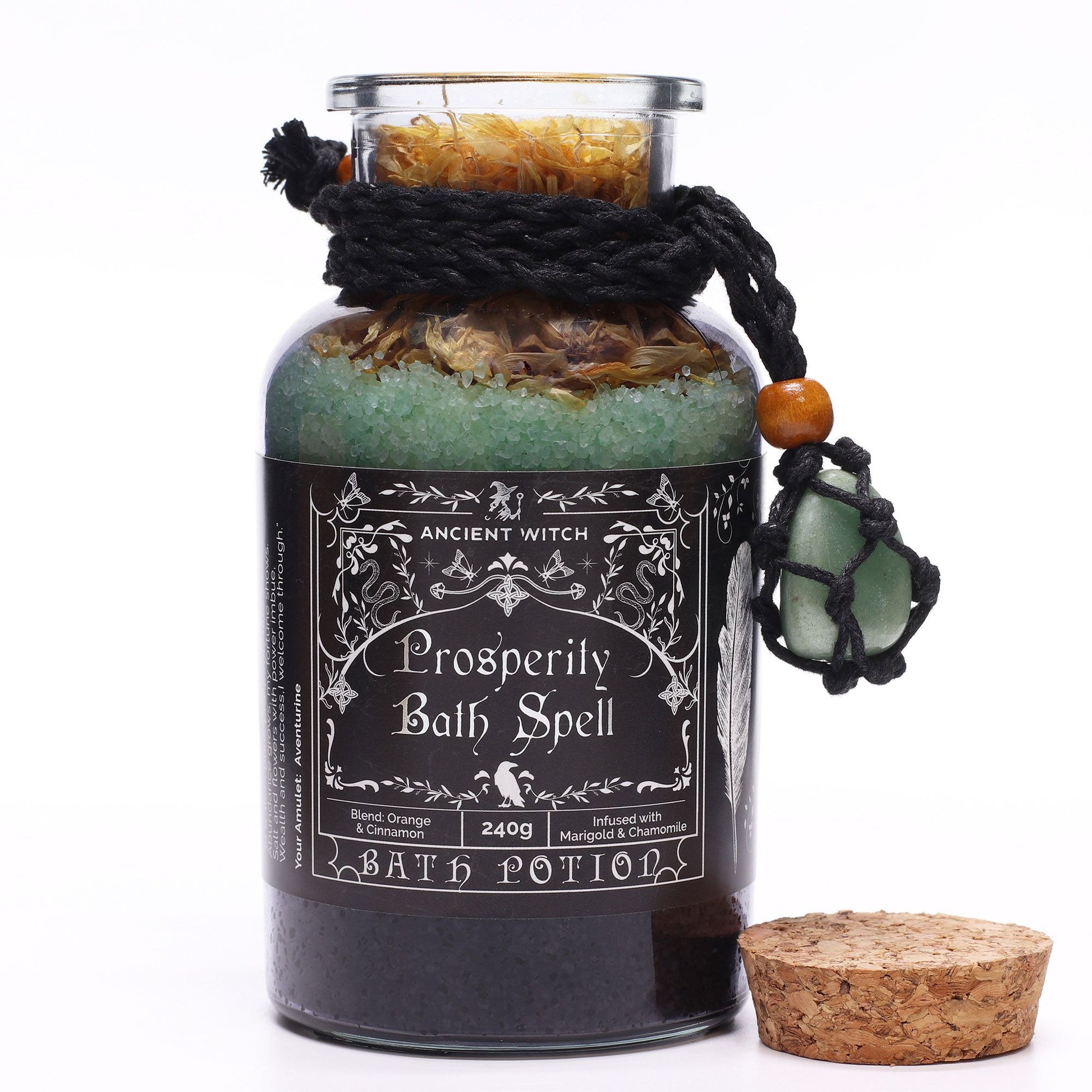 Open the path to abundance with the Ancient Witch Prosperity Bath Spell Potion & Aventurine Crystal Amulet, a handcrafted ritual blend created to attract wealth, opportunity, and positive energy. This luxurious 240g potion combines orange and cinnamon essential oils with marigold and chamomile petals, forming a warm, aromatic bath that uplifts the spirit and aligns your energy with growth and good fortune.

Each apothecary-style glass bottle is sealed with a cork lid and adorned with a genuine Aventurine cr