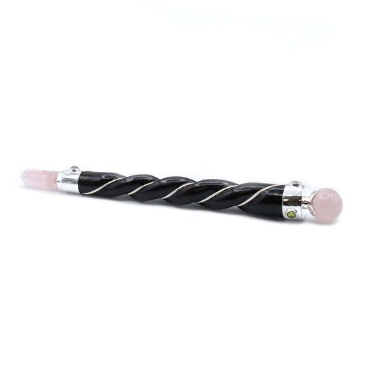 Let love flow through every layer of your being with the Twisted Healing Wand – Silver Rose Quartz Sphere. Handcrafted with intention, this sacred tool features a spiraling form that channels energy gracefully and a silver-set Rose Quartz sphere that glows with the soft vibration of compassion and emotional healing.

Rose Quartz is the stone of unconditional love, soothing the heart and nurturing your connection to self, others, and the divine. Its gentle energy helps dissolve emotional wounds, restore trus