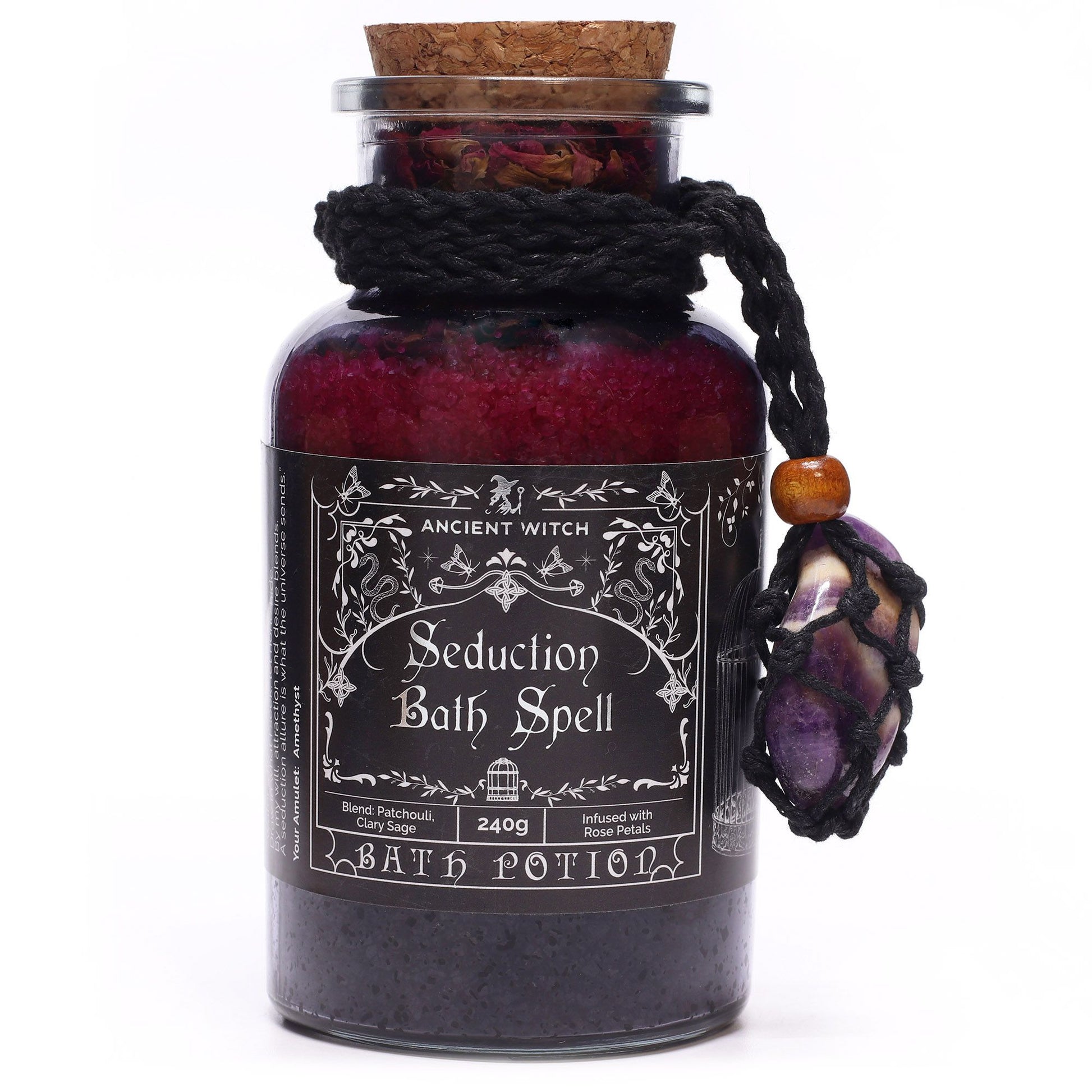 Awaken desire and spiritual allure with the Ancient Witch Seduction Bath Spell Potion &amp; Amethyst Crystal Amulet, a handcrafted 240g ritual blend designed to harmonise sensual energy with higher consciousness. This enchanting potion merges Epsom salts, amethyst-charged intention, and a captivating blend of ylang-ylang, jasmine, and patchouli essential oils, creating a bath ritual that ignites passion while nurturing calm inner balance.