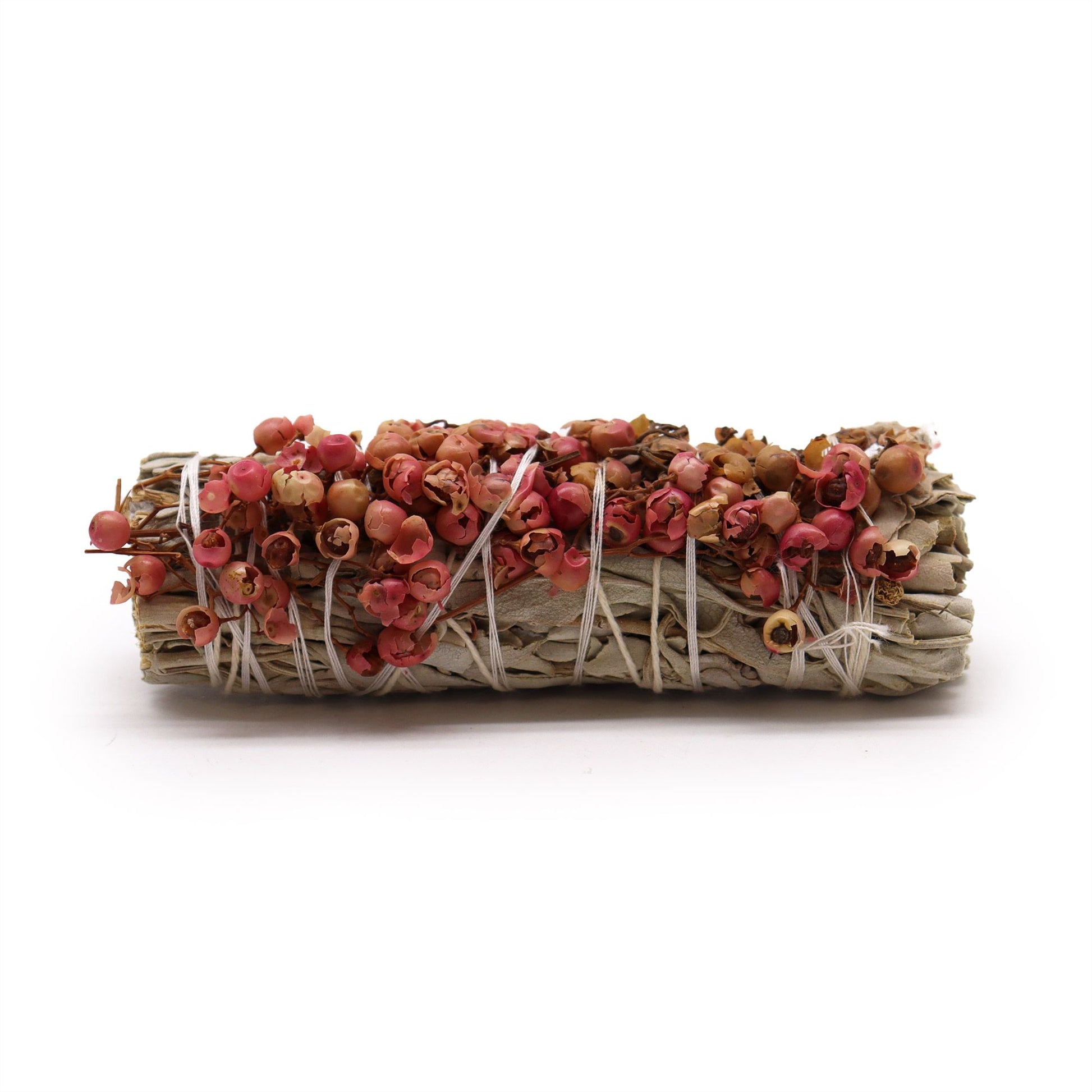 Walk the sacred path with this White Sage and Pirul Seed Smudge Stick, a potent fusion of spiritual purity and protective fire. Pirul, also known as Peruvian pepper tree seed, is revered in indigenous traditions for its power to banish hexes, curses, and intrusive spirits.

White Sage acts as a purifier—clearing stagnant energy and aligning the aura—while Pirul Seed amplifies protection, forming a spiritual shield and calling in warrior ancestors to stand guard. Together, they create a smudge blend ideal fo