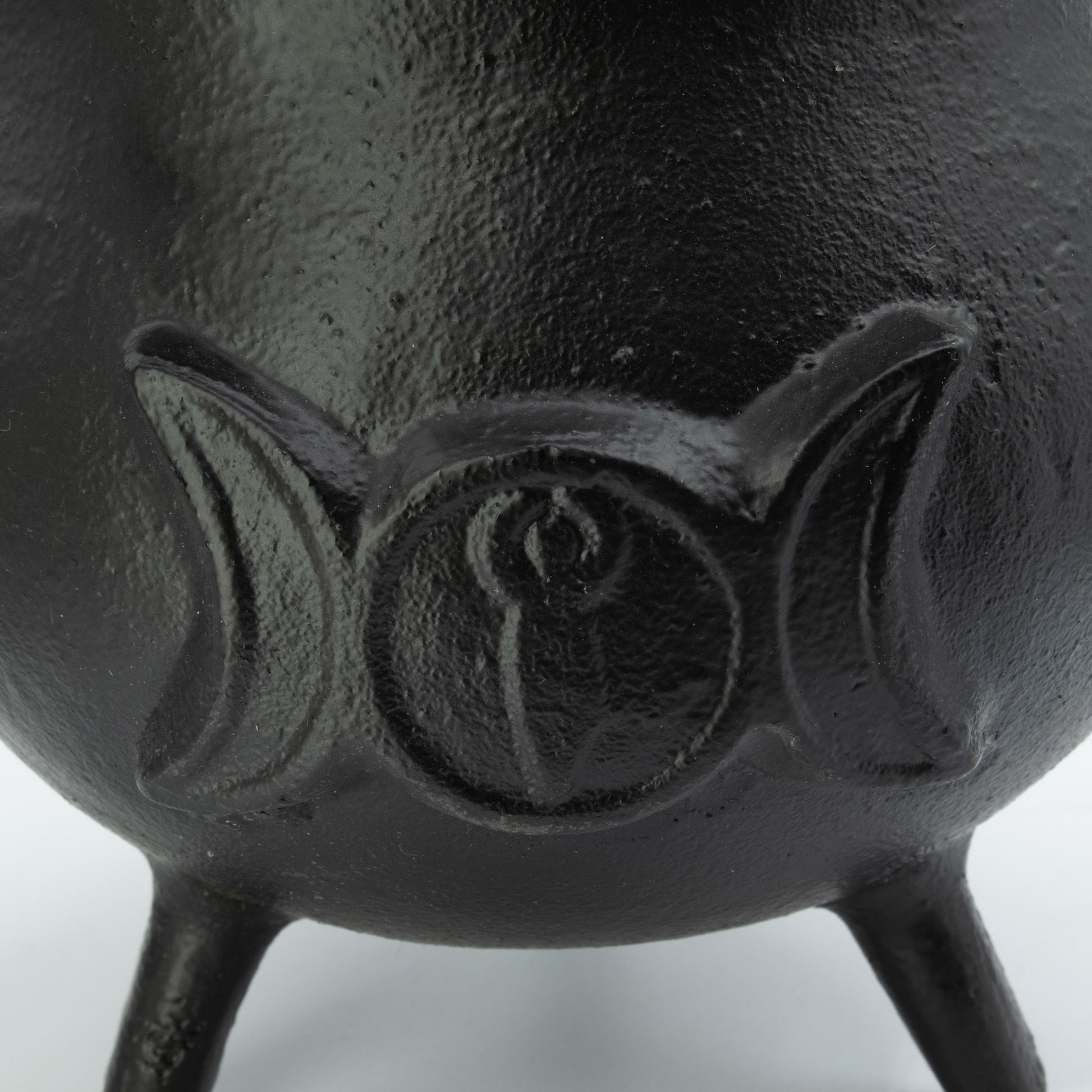 Make a powerful statement on your altar with this Extra Huge Cast Iron Triple Moon Cauldron, a substantial ritual vessel crafted for practitioners who appreciate authenticity, durability, and commanding presence. Embossed with the sacred Triple Moon symbol, this cauldron represents the Maiden, Mother, and Crone, embodying intuition, feminine power, and the cycles of life, death, and rebirth.

Weighing over 4kg, this impressive cast iron cauldron offers exceptional strength and longevity. Its generous capaci