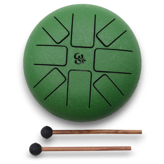 Open your heart to the sacred sound of Om with the Hapi Drum Om Green – 16cm, a compact yet powerful healing tool infused with loving intention. This vibrant green drum resonates with the energy of the heart chakra (Anahata), inviting balance, compassion, and emotional release through sound.

Tuned across 8 gentle tones, it is perfect for personal meditation, sound healing sessions, energy alignment, or simply reconnecting with your breath and presence. Its size makes it easy to carry and play, whether in y