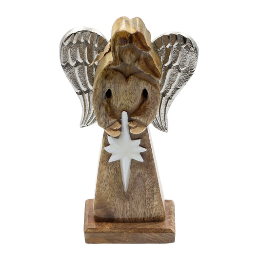Wooden angel figurine with a candle on a white background