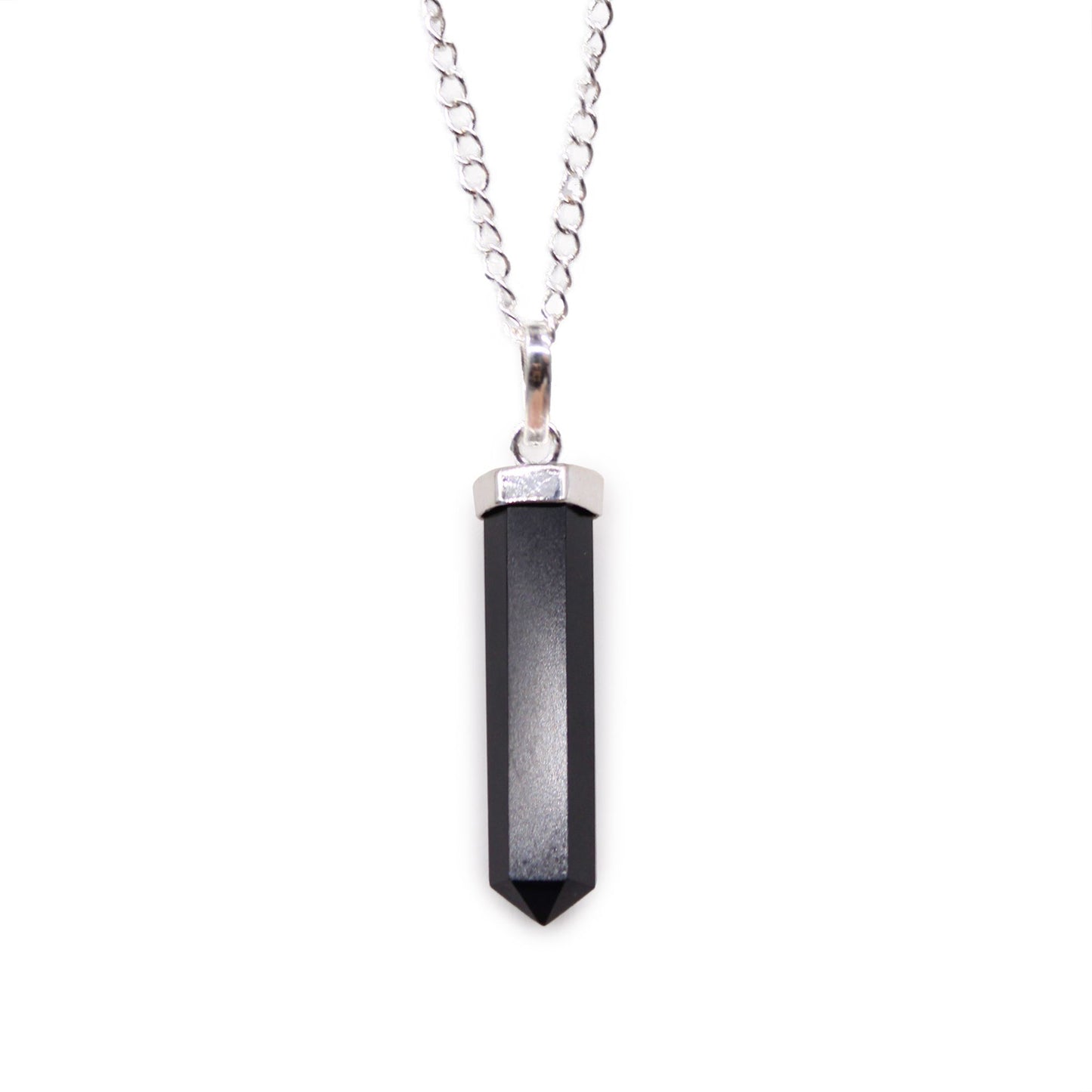 Black Agate is often associated with grounding, strength and protection, making this pendant a meaningful choice for everyday wear or a thoughtful gift for someone drawn to darker crystals.

Finished with a silver-plated chain, it pairs easily with casual outfits, layered jewellery and alternative styling. Natural variations in the stone mean each pendant may have slight differences in tone and finish.